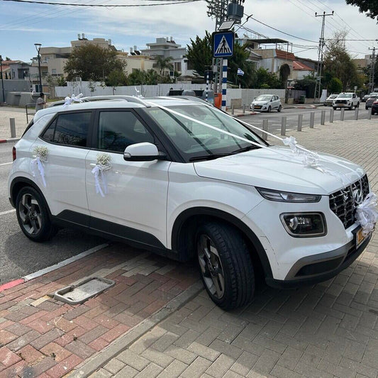 קישוט רכב מיוחד לחתונה מגיבסניות וסרטים לבנים